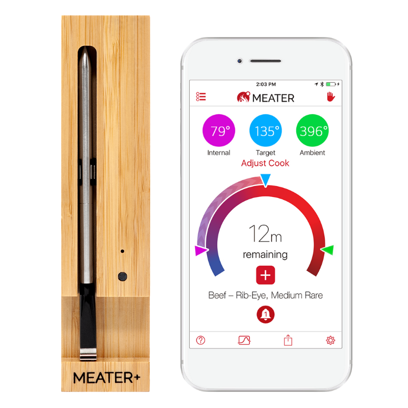 Meater probe in a bamboo holder, and phone showing meater app in action