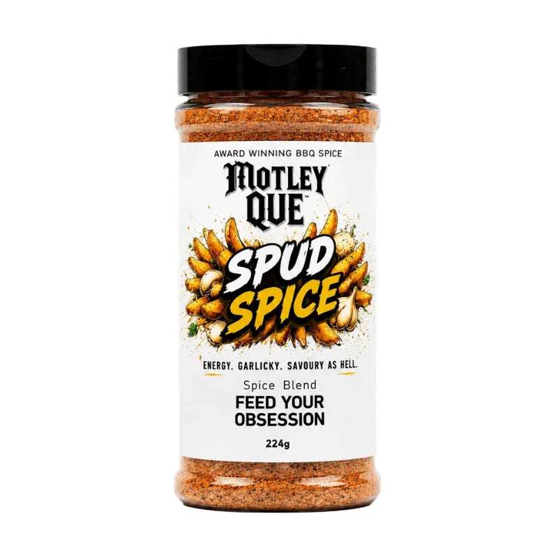 A bottle of Motley Que Spud Spice spice blend on a clean white background. The bottle contains orange-brown seasoned potatoes and has a black cap with a white label featuring the brand name and product name.