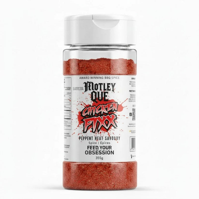 Spice container labeled 'Motley Que Chicken Fixx' on a white background