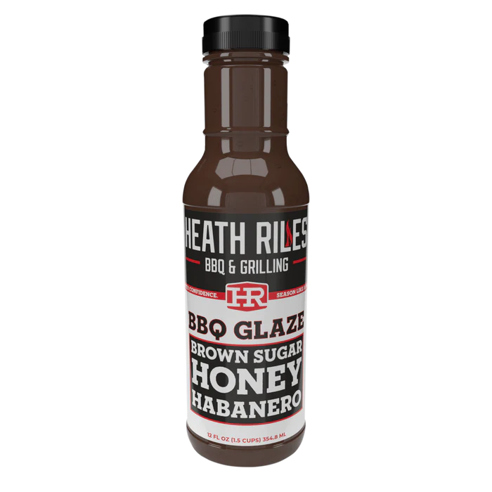 Bottle of Heath Riles BBQ Glaze with brown sugar, honey, and habanero flavor on a white background