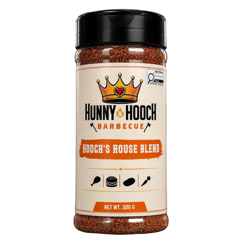 A 300g plastic jar of Hunny & Hooch Barbecue seasoning blend, featuring a cream-colored label with a gold crown logo and orange accents, topped with a black lid, set against a solid black background.
