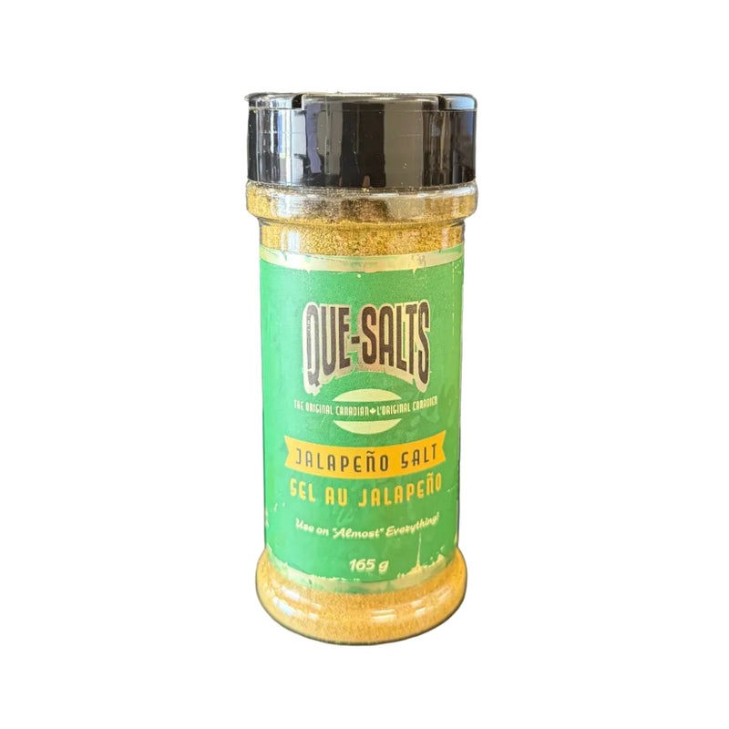 Clear shaker bottle with a green label on a white background