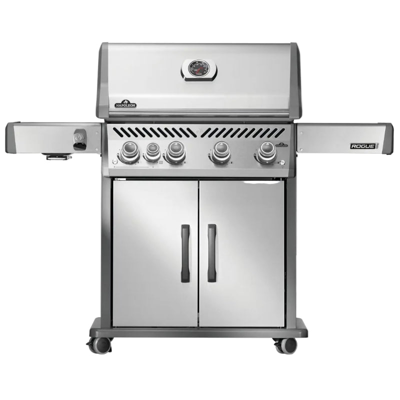 Stainless steel barbecue grill with multiple burners on a white background