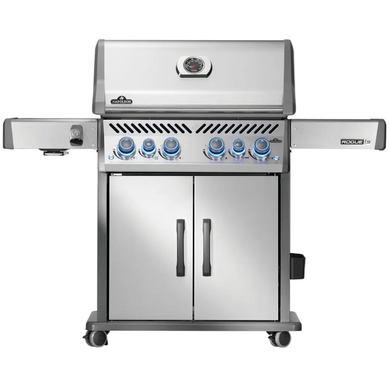 Stainless steel grill with multiple burners on a white background
