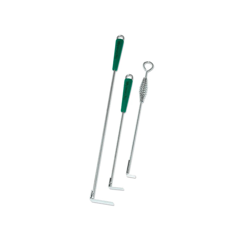 Three metal tools with green handles on a white background