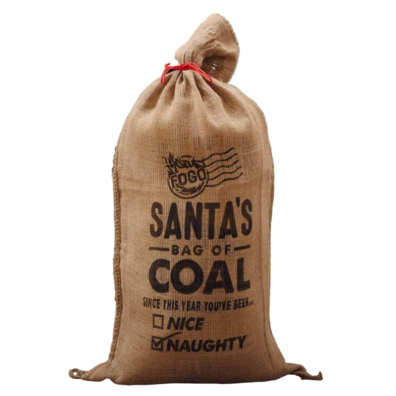 Burlap bag labeled 'Santa's Bag of Coal' with festive outdoor background