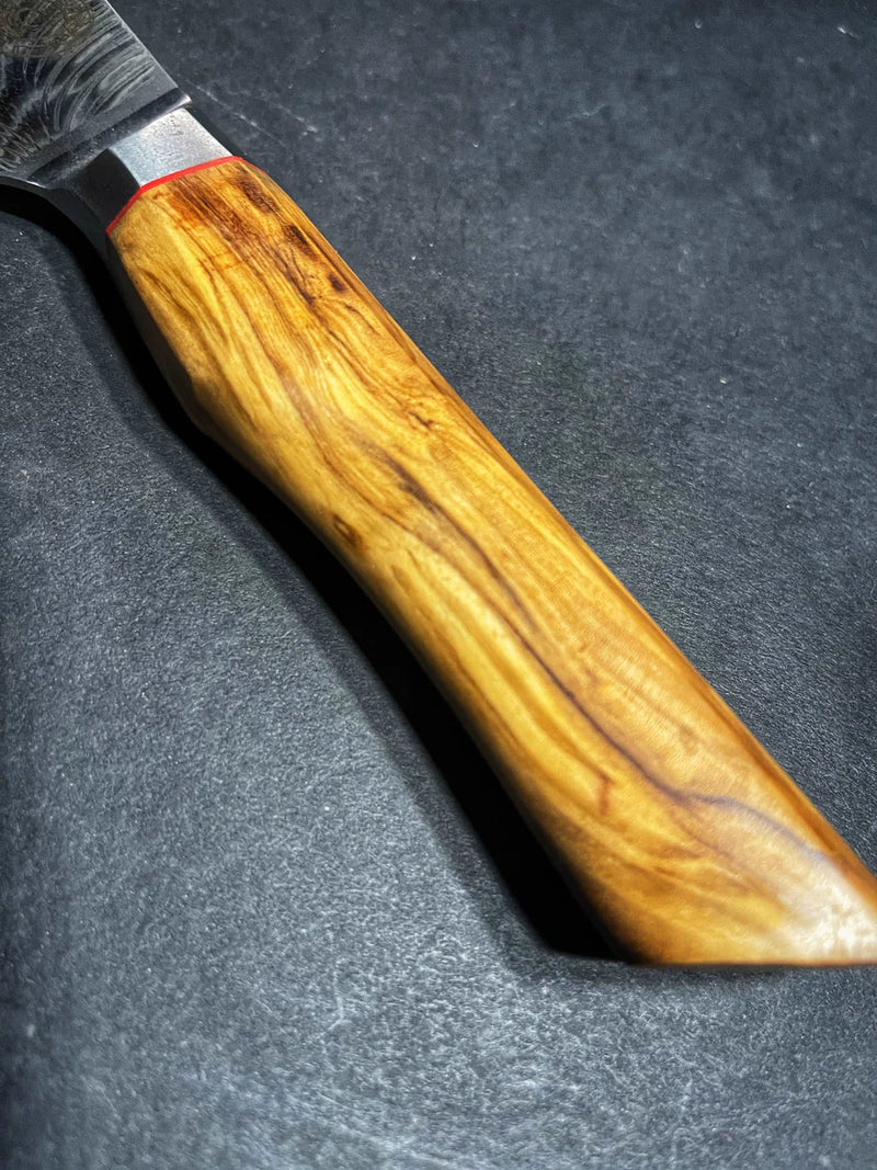 Knife with a wooden handle on a dark gray background