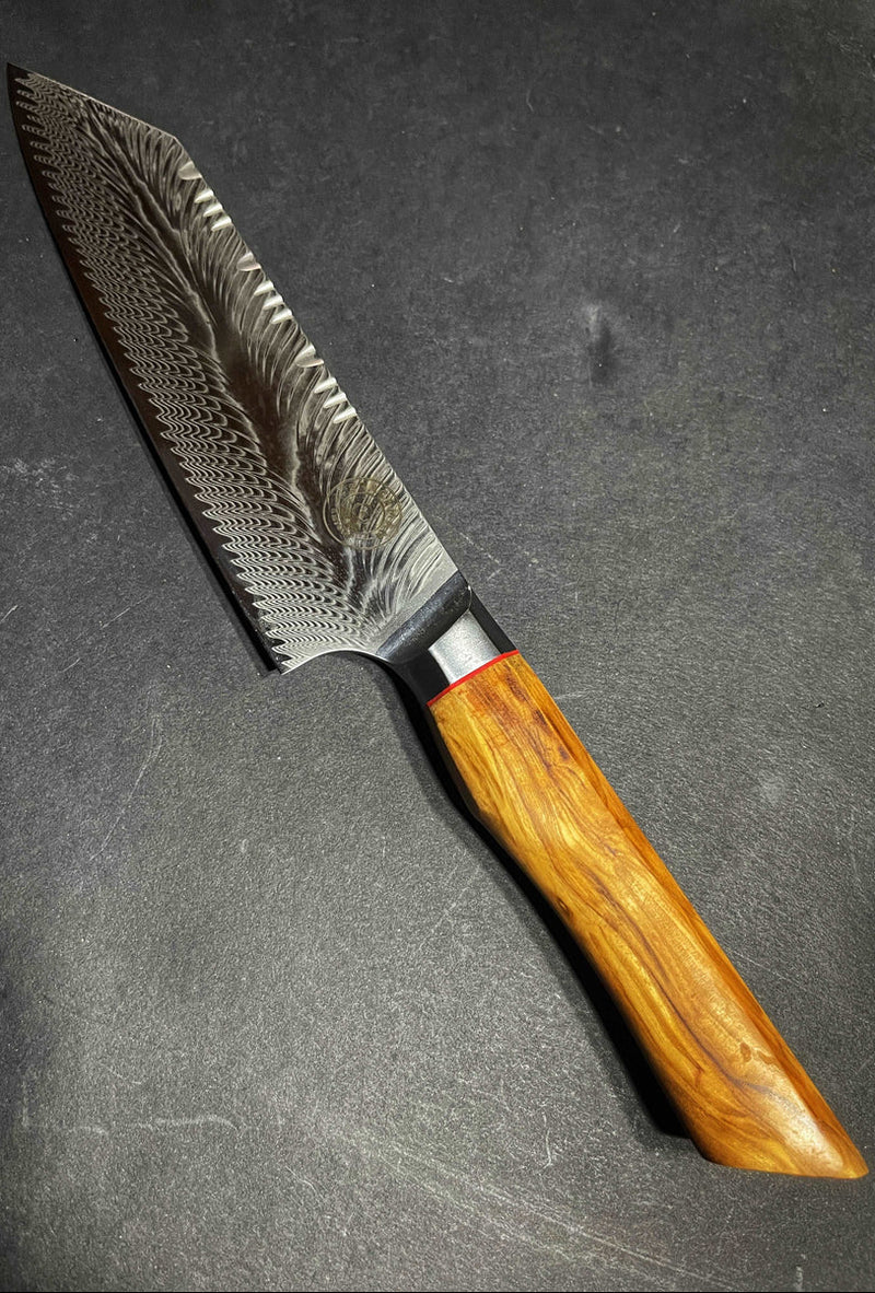 Decorative knife with a wooden handle on a dark surface