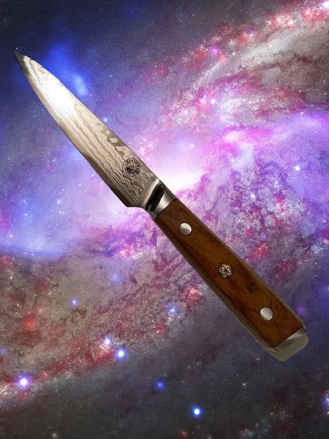 Knife with a wooden handle against a space-themed background