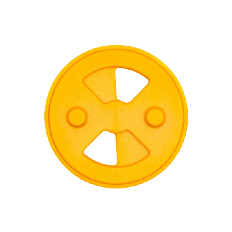 Yellow, plastic disk to restrict airflow 