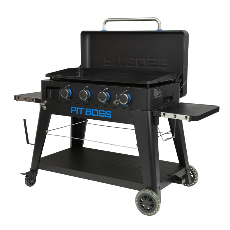 Pit Boss 4-burner Ultimate with the lid open, exposing the flat cooking surface