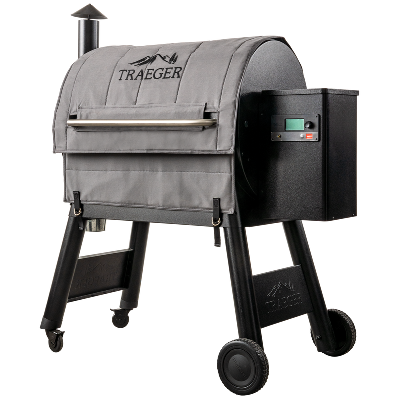 Grey, thick fabric that covers the barrel of the grill and fastens at the bottom via buckles